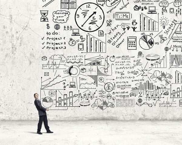 Young businessman carrying banner with his great business plan